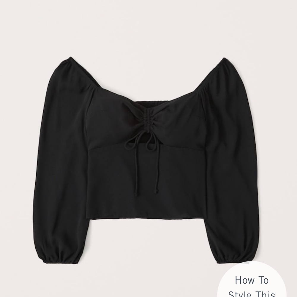 Long sleeved cinched front top NWOT